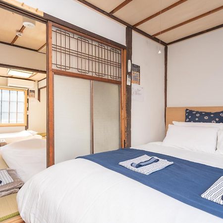 Guesthouse Oneworld Shijo四条京町屋 เกียวโต ภายนอก รูปภาพ