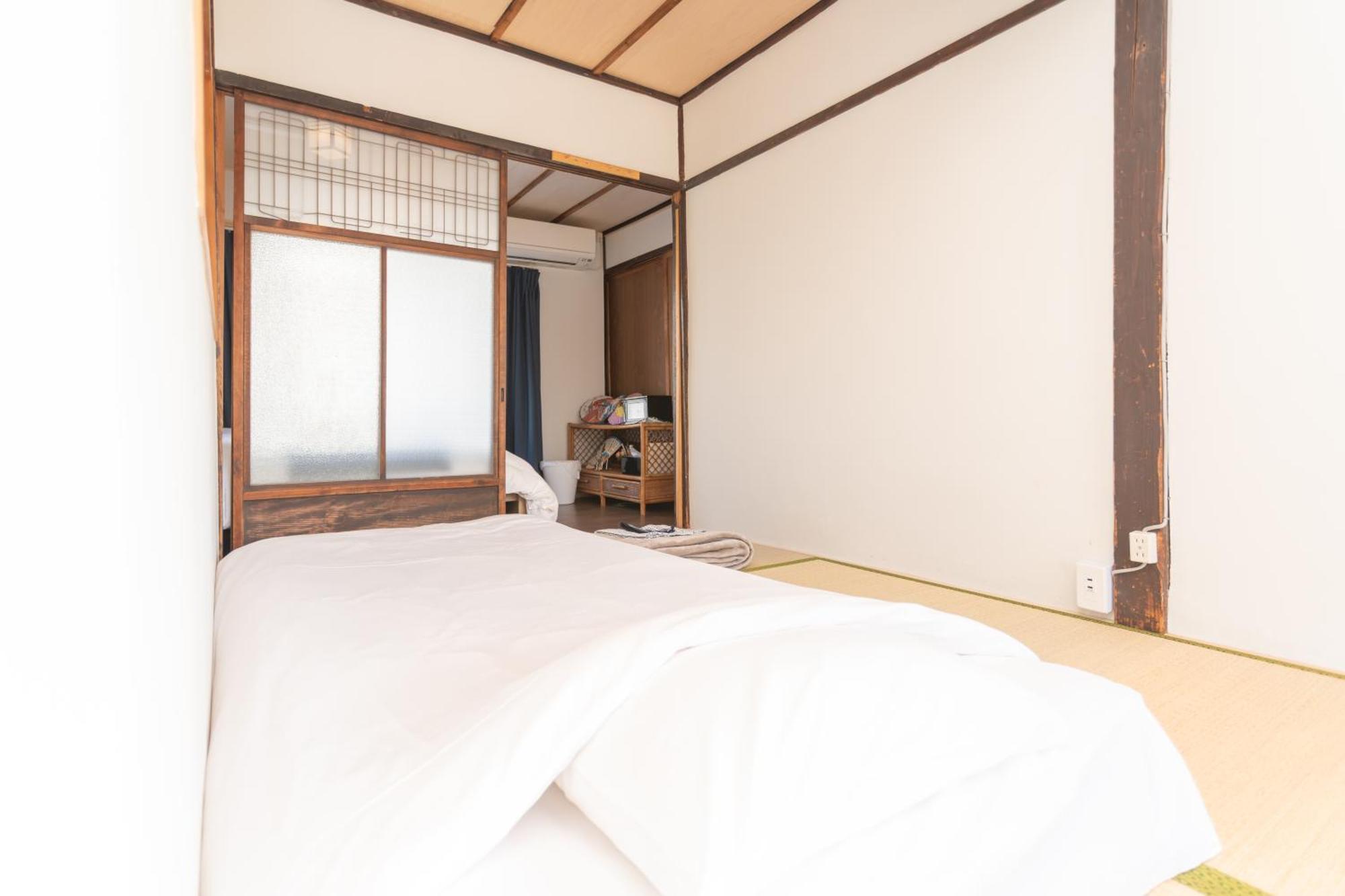 Guesthouse Oneworld Shijo四条京町屋 เกียวโต ภายนอก รูปภาพ