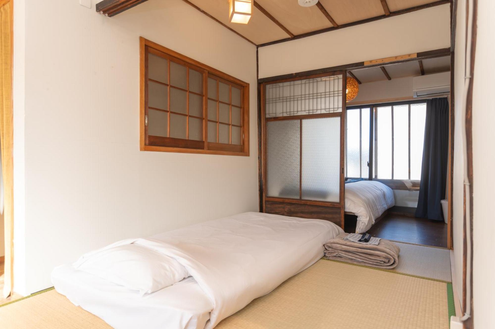Guesthouse Oneworld Shijo四条京町屋 เกียวโต ภายนอก รูปภาพ